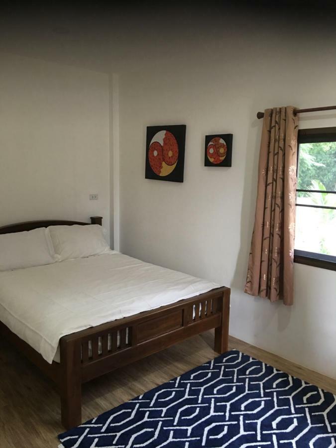 Sunray Guesthouse สุนันท์บ้านพักริมคลอง Uthai Thani Exterior foto
